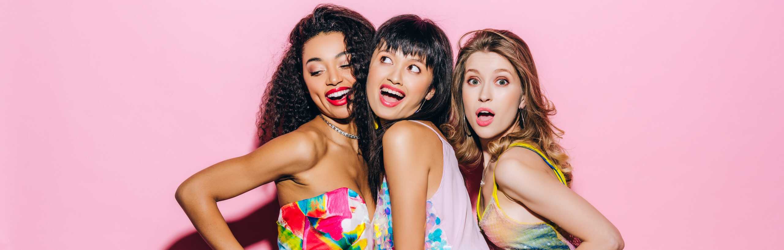 Picture of three women smiling.